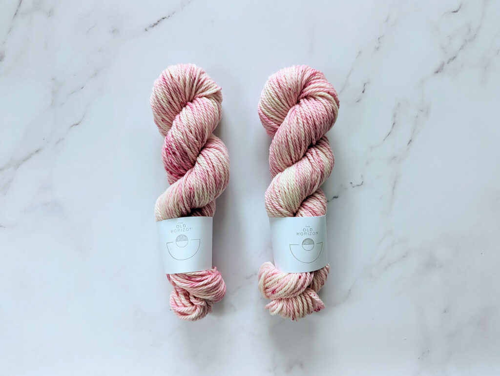 chunky weight pink hand dyed yarn with raspberry speckles