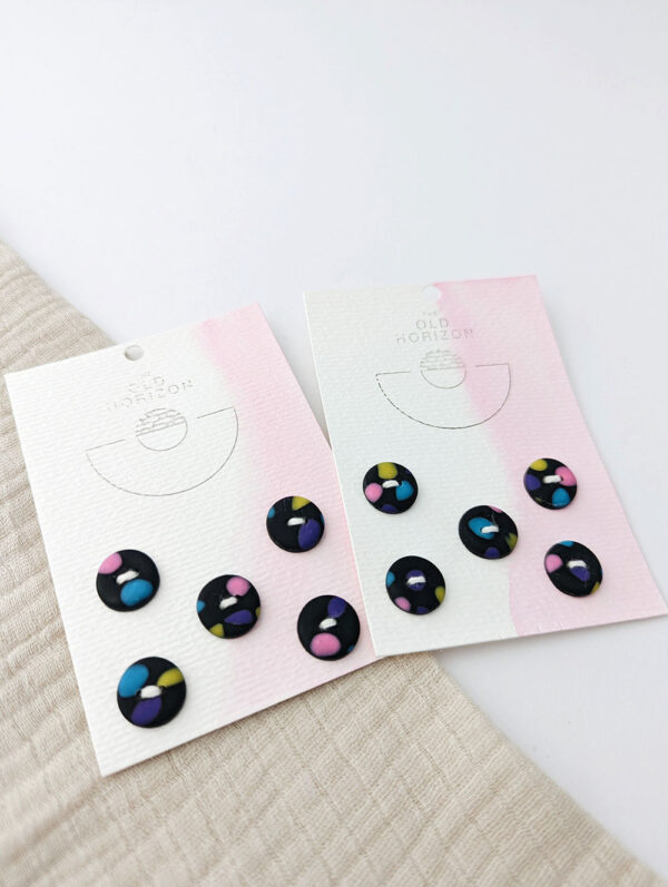 Sets of black polymer clay buttons with unique confetti design
